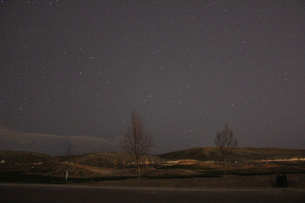 A Lyrid shower meteor streaks through the nighttime sky in Idaho.